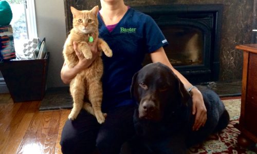 Dr. Maskery with Reese the dog and Rudy the cat